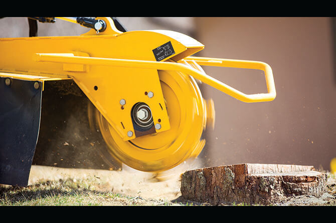 close up of stump grinder blades rotating